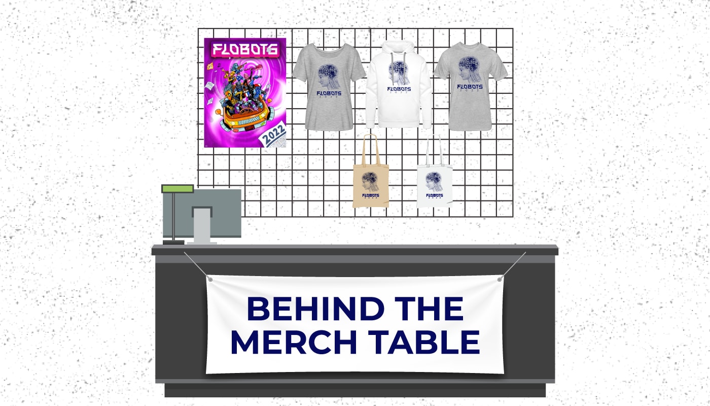 behind the merch table
